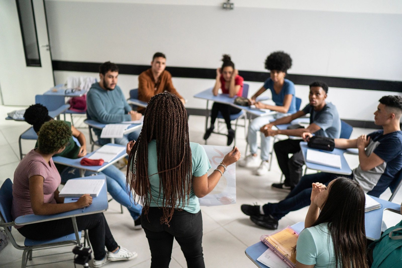 Student presenting in a classroom