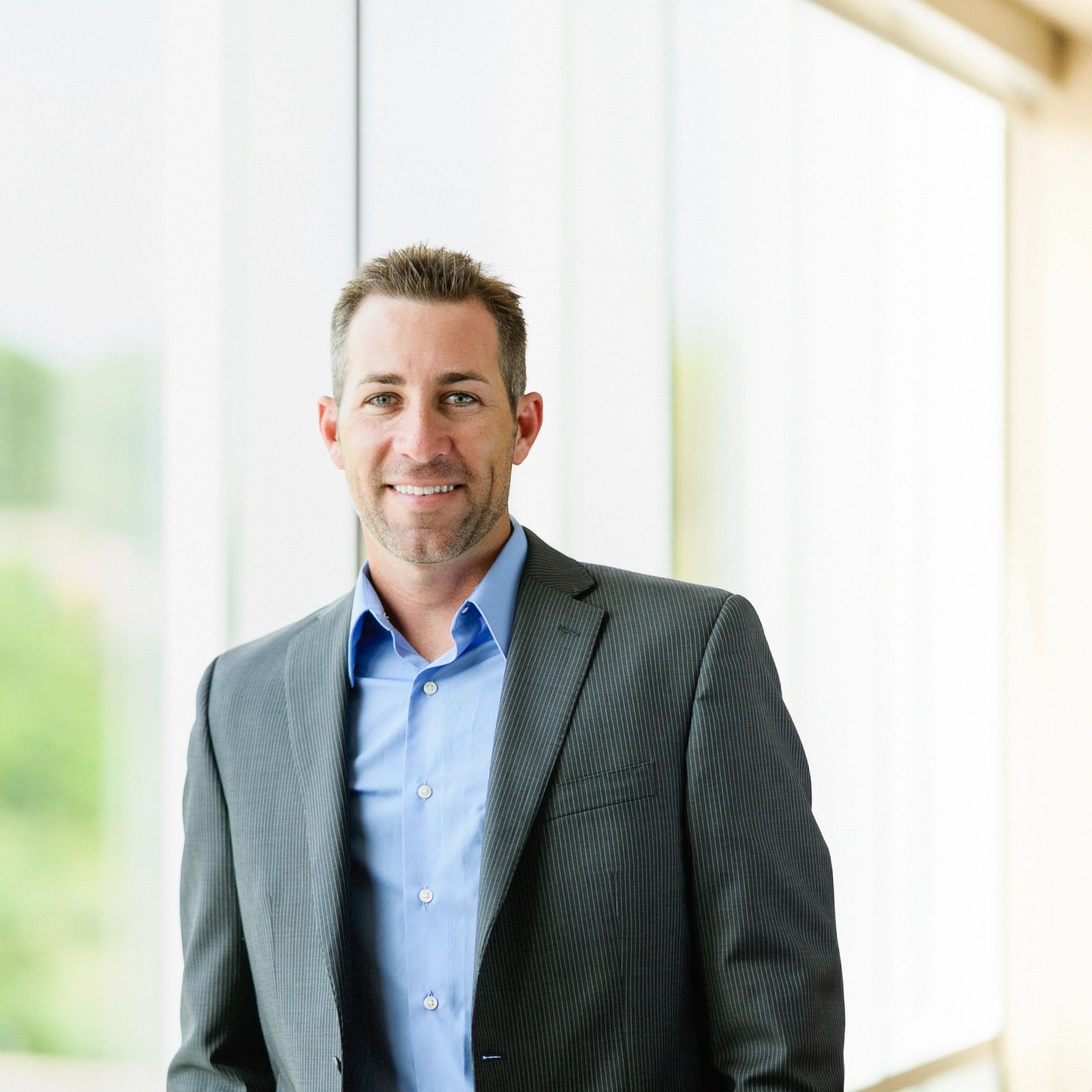 Professional headshot of a business team member